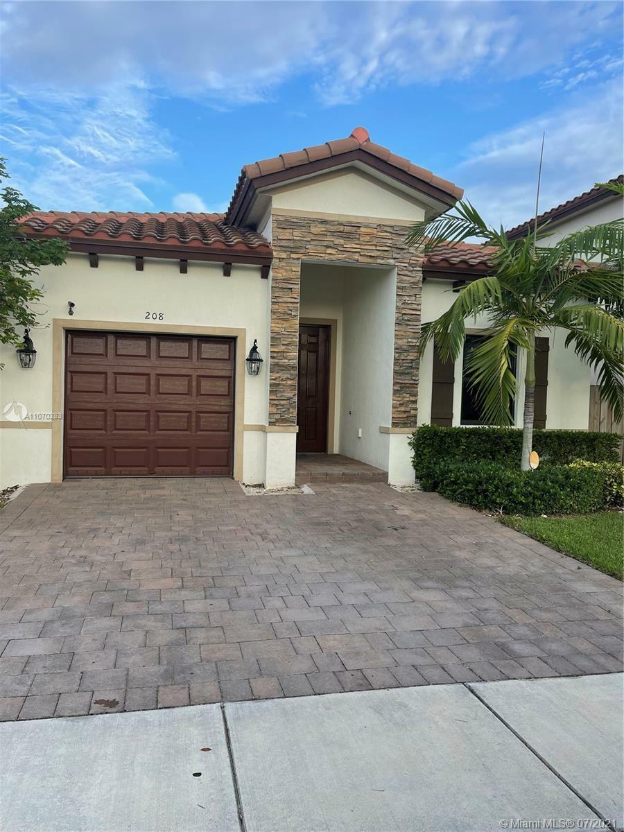 Property Photo:  208 NE 23rd Ter  FL 33033 