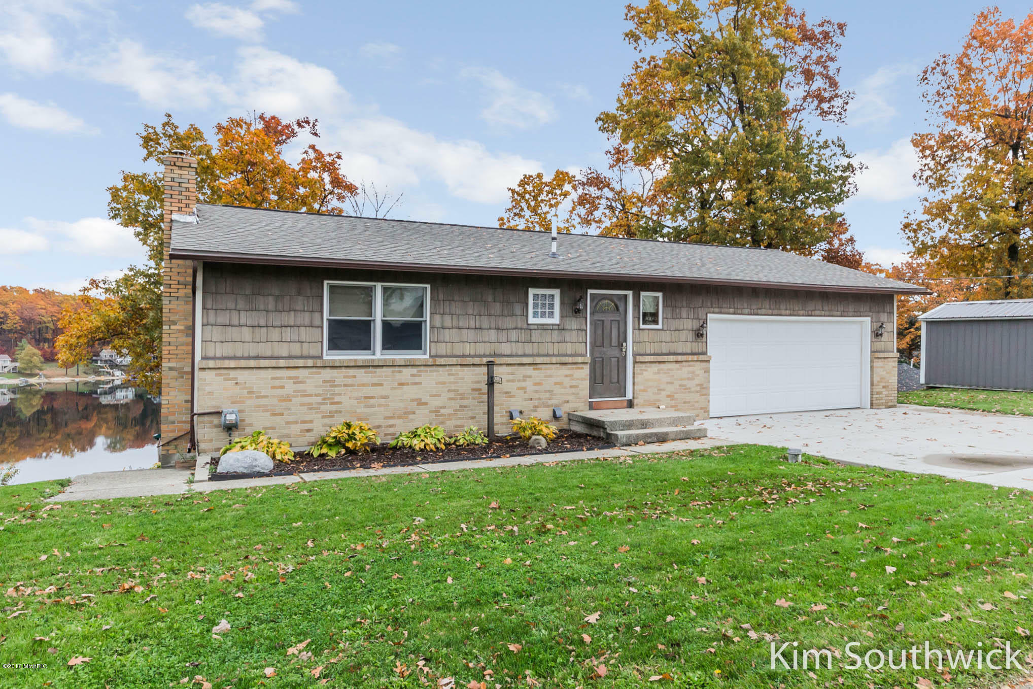 Property Photo: 7492 Hallridge Drive NE MI 48809