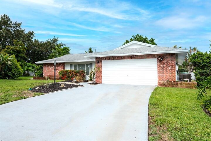 Property Photo:  7409 13th Avenue W  FL 34209 