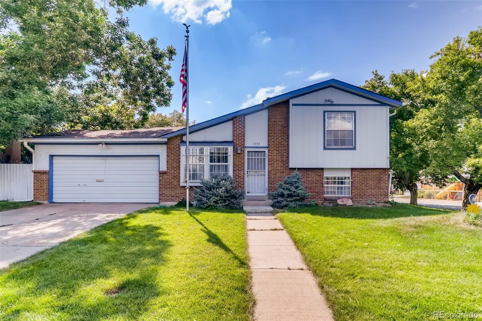 Property Photo: 1597 S Krameria Street CO 80224