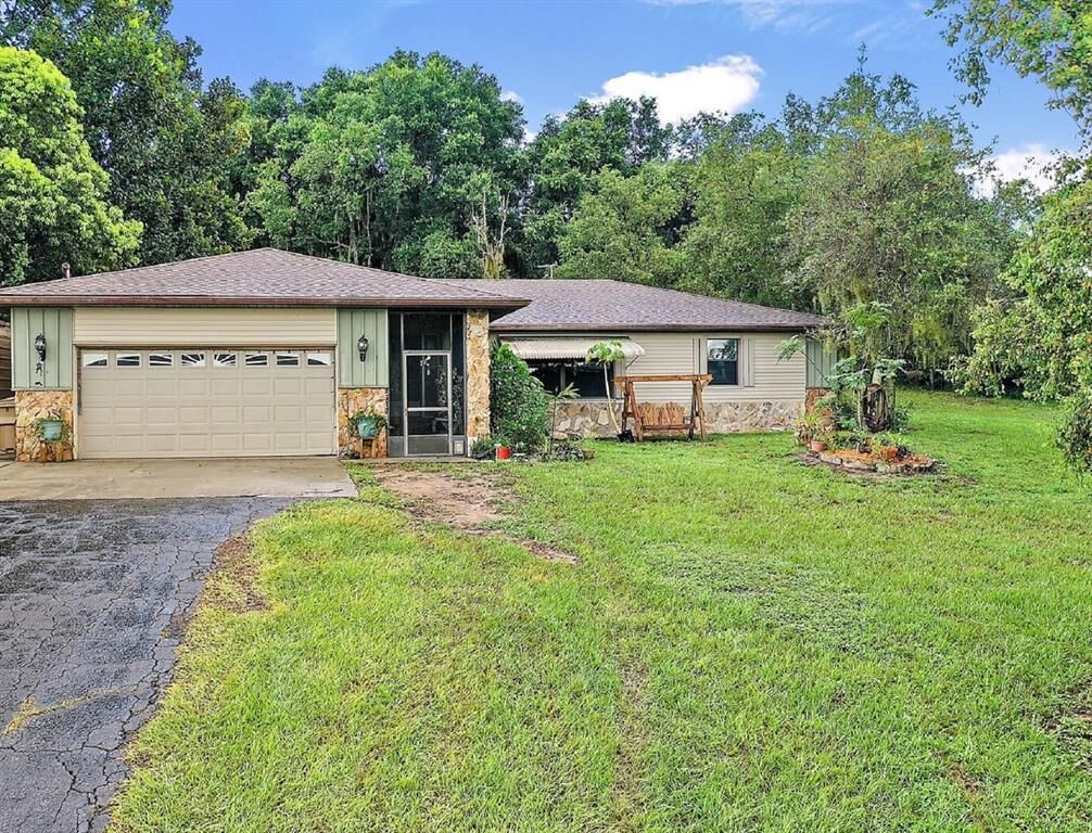Property Photo:  10822 E Revels Road  FL 34737 