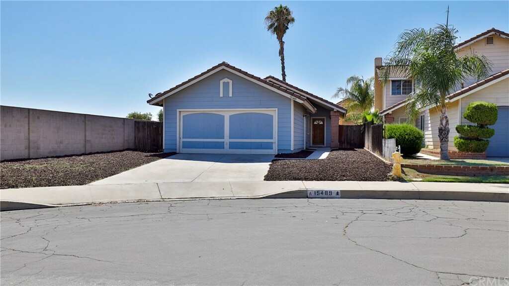 Property Photo:  15489 Theresa Avenue  CA 92551 