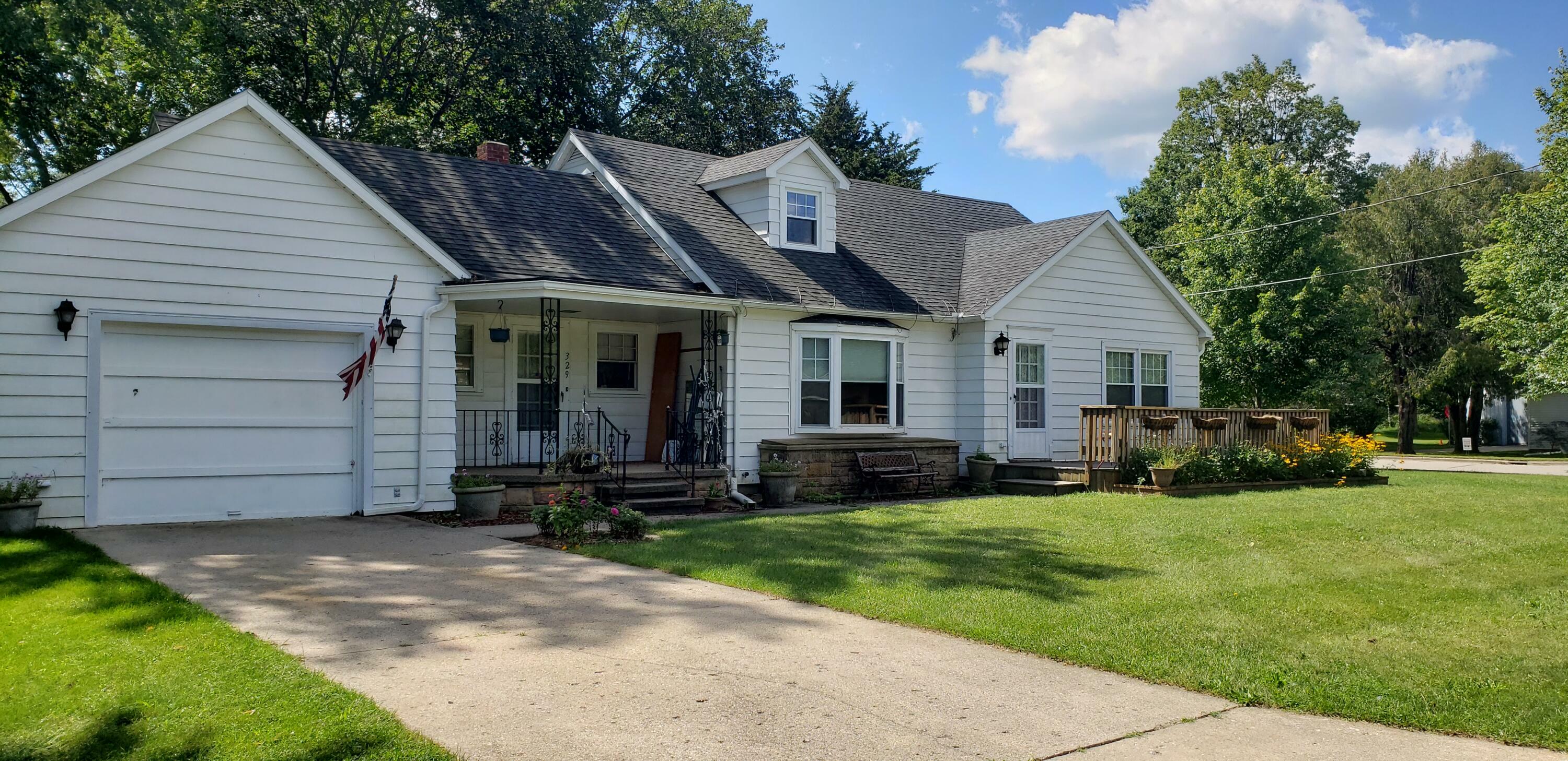 Property Photo:  329 W Bellevue Street  MI 49307 