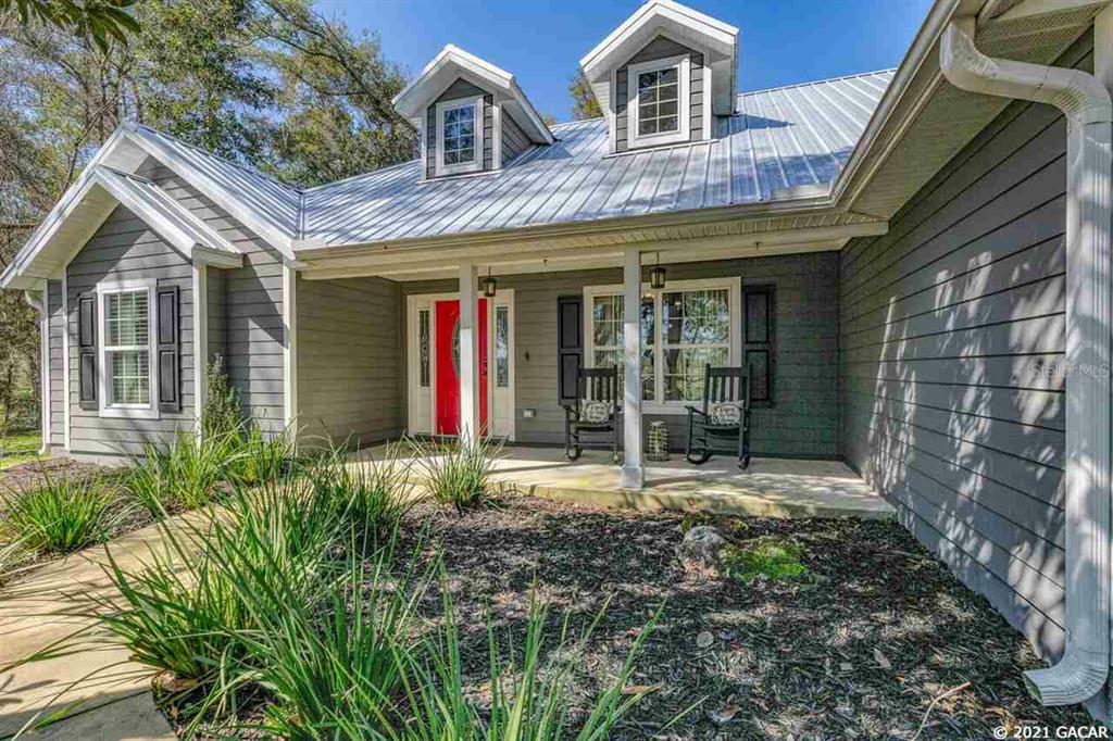 Property Photo:  10030 SW Archer Boulevard  FL 32608 