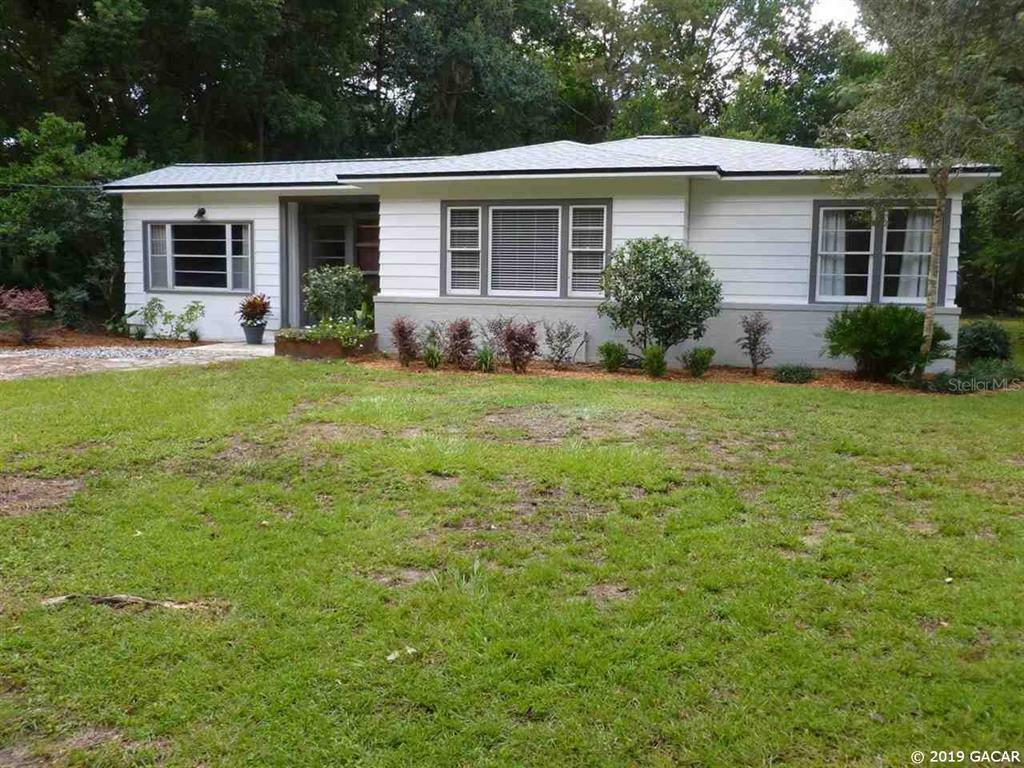 Property Photo:  1019 NW 25th Avenue  FL 32609 