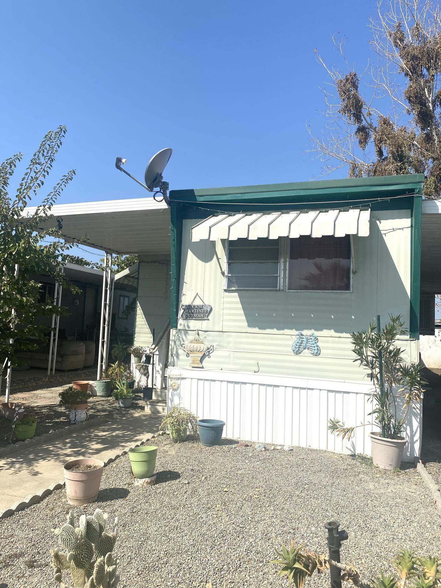 Property Photo:  720 E Worth Avenue 208  CA 93257 