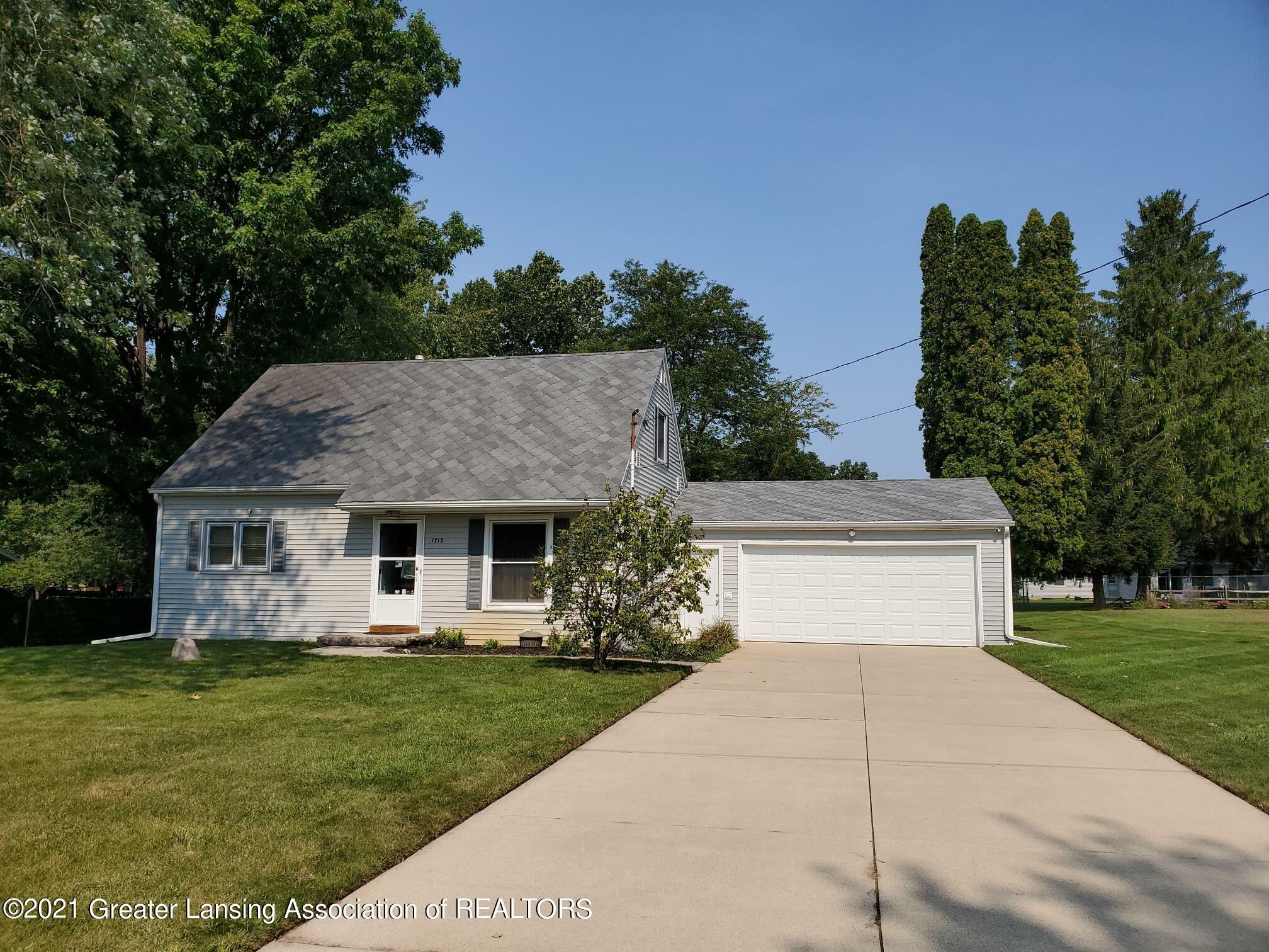 Property Photo:  1713 Yorkleigh Drive  MI 48906 