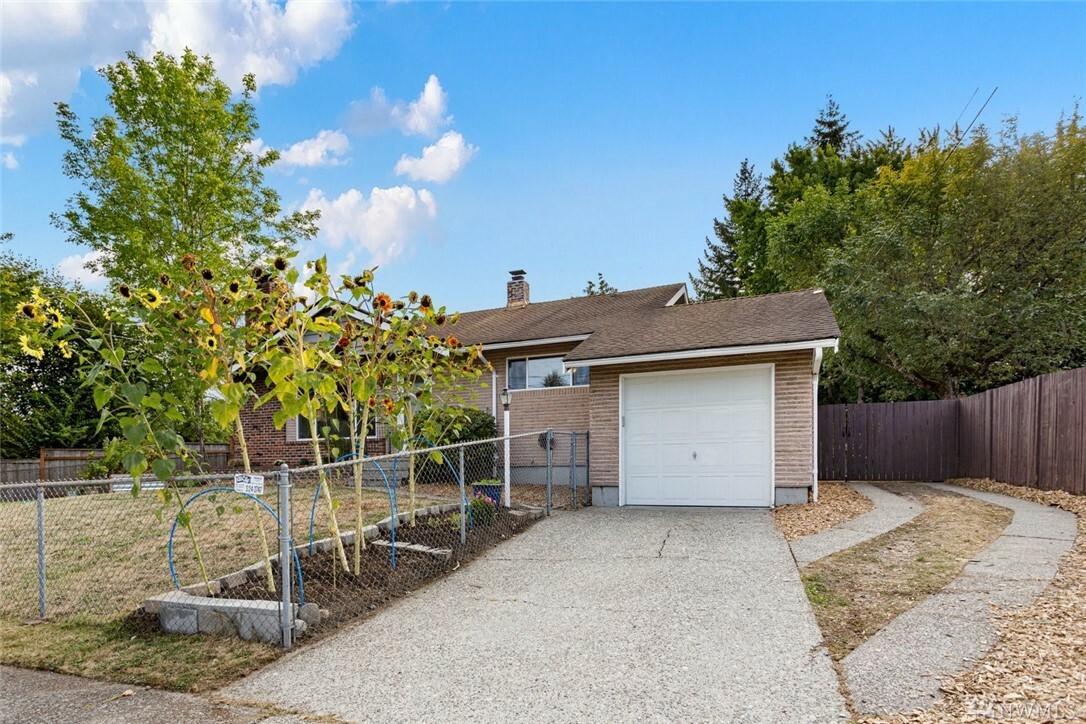 Property Photo:  10741 63rd Ave S  WA 98178 