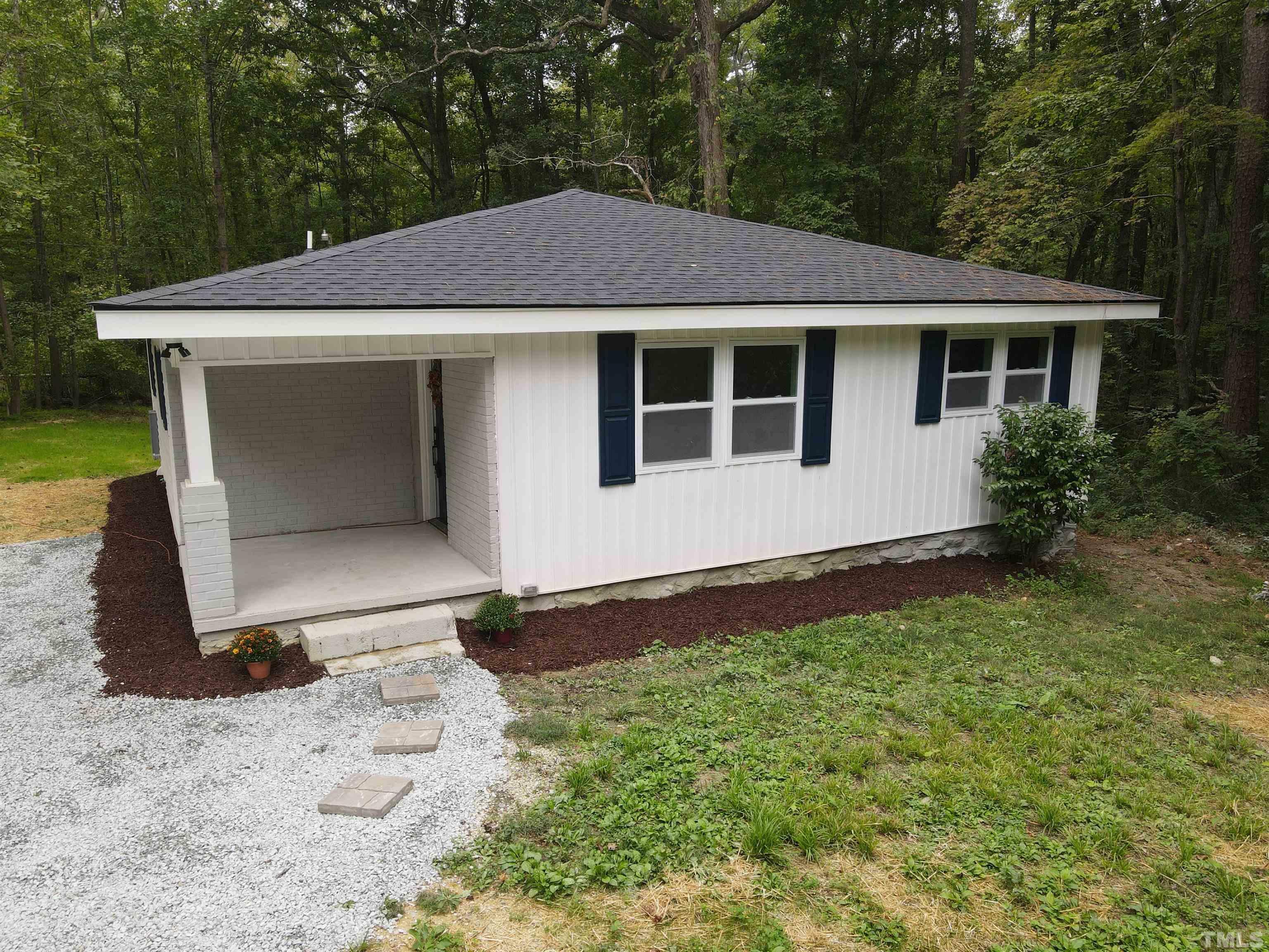 Property Photo:  902 Old Lystra Road  NC 27517 