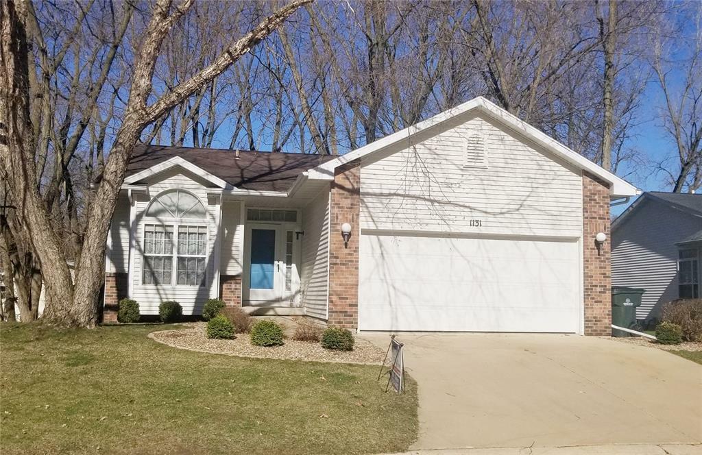 Property Photo:  1131 Forest Glen Court SE  IA 52403 