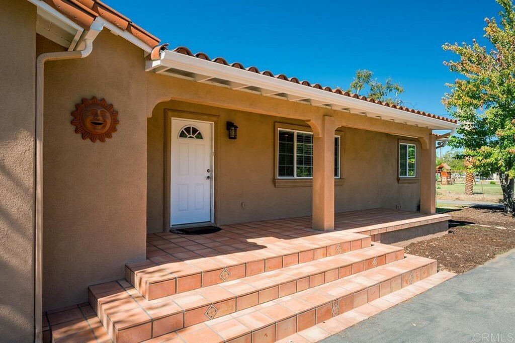 Property Photo:  11424 Moreno Avenue  CA 92040 