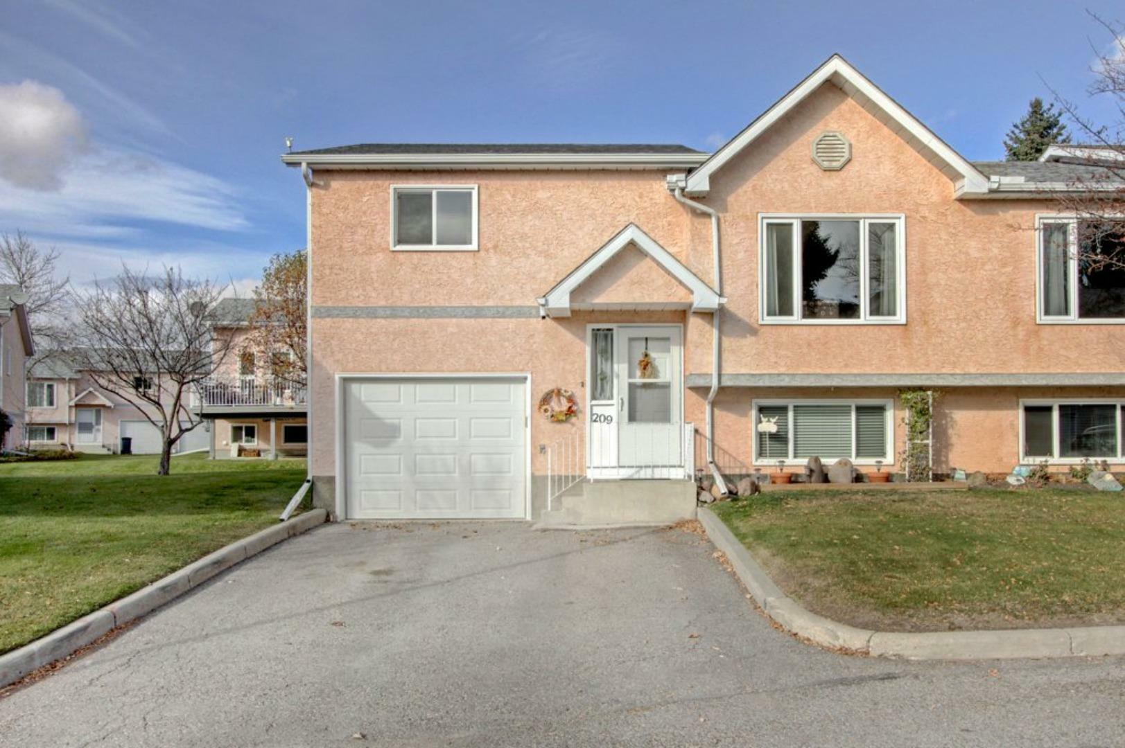 Property Photo: 209 Fairway Drive NW AB T1V 1C9