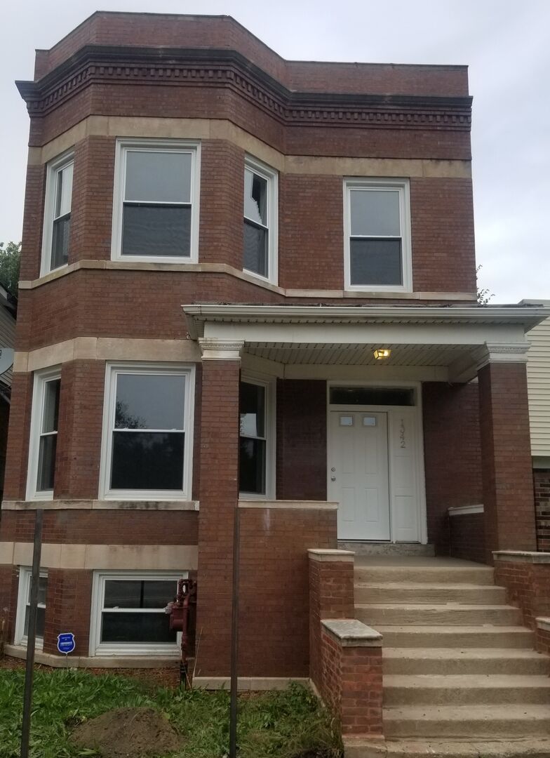 Property Photo:  1042 W Marquette Road 2  IL 60621 