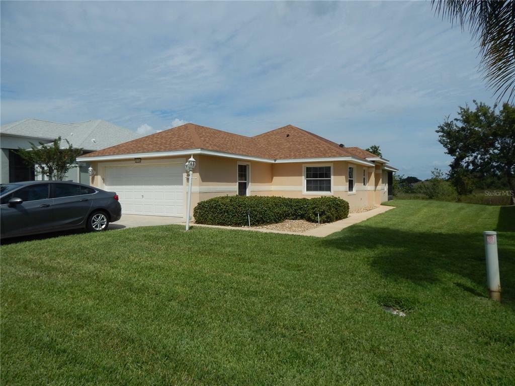 Property Photo:  5715 Illumination Lane  FL 34748 