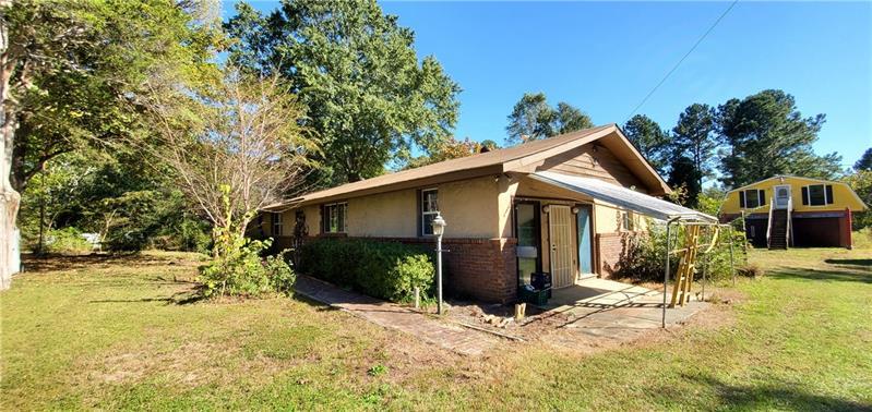 Property Photo: 3735 Sunny Hill Drive GA 30052