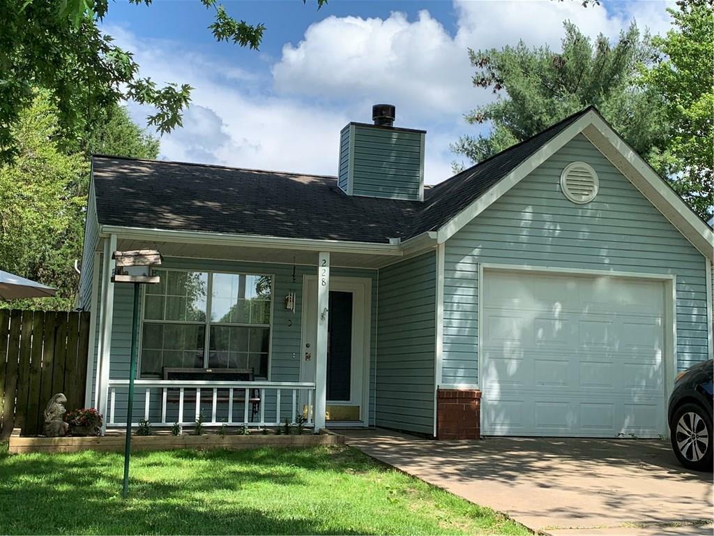 Property Photo:  228 NW J Street  AR 72712 