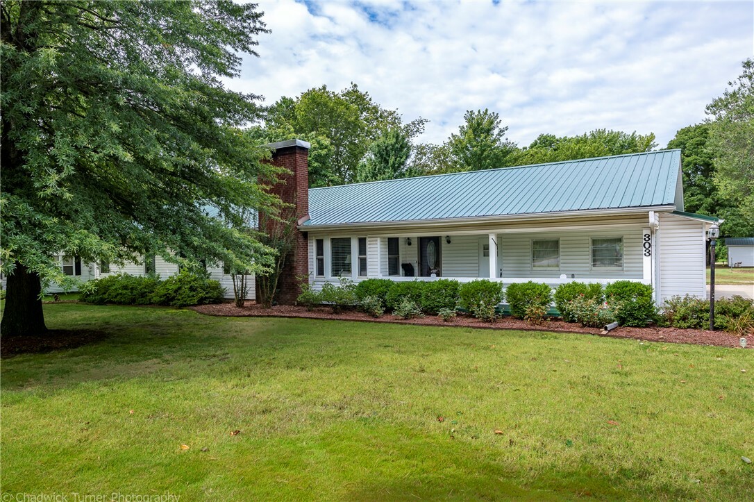 Property Photo:  303 S Dixieland Road  AR 72758 