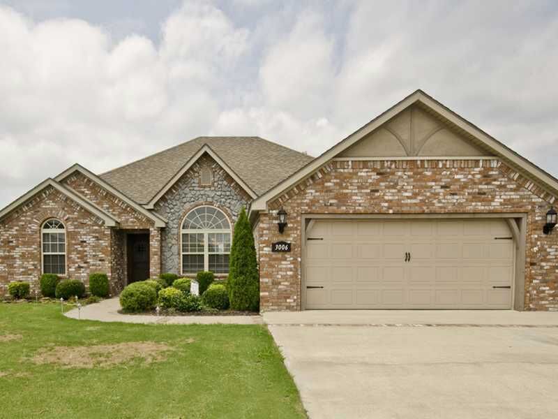 Property Photo:  3006 SW Silverbark Road  AR 72712 