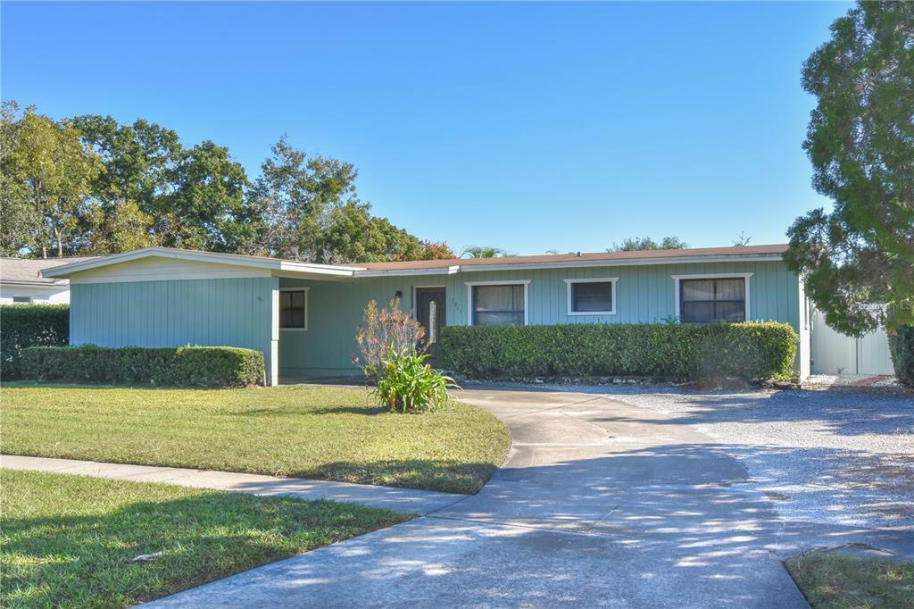 Property Photo:  7911 Plunkett Avenue  FL 32810 