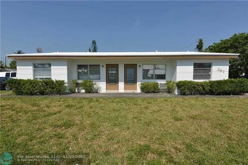 Property Photo:  391 NE 42nd Ct  FL 33334 