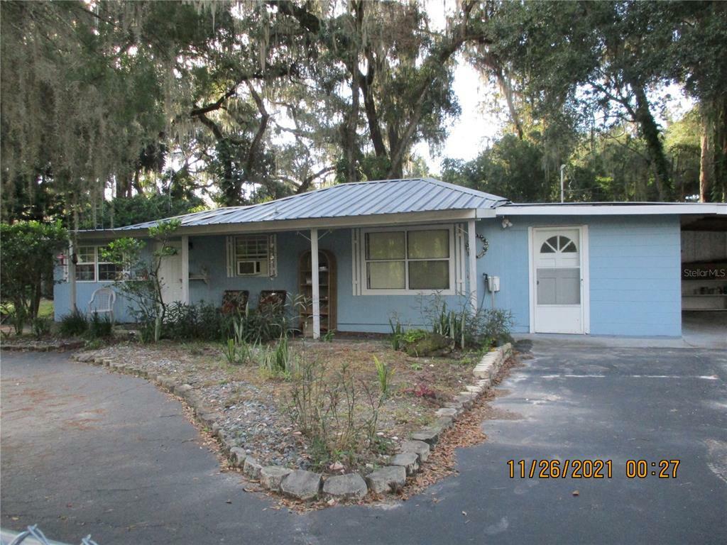 Property Photo:  1883 Cr 422  FL 33538 