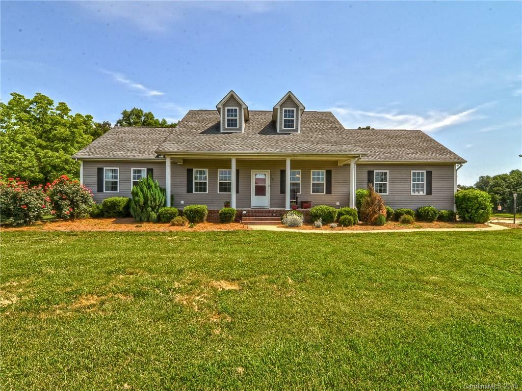 Property Photo:  6925 Medlin Road  NC 28112 