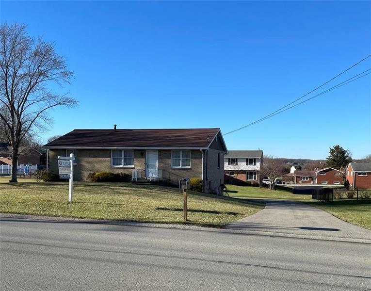 Property Photo:  1409 Mission Rd  PA 15650 