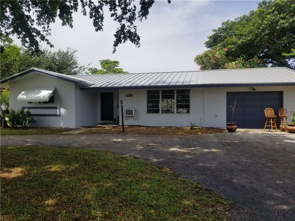 Property Photo:  5101 NE 27th Avenue  FL 33064 