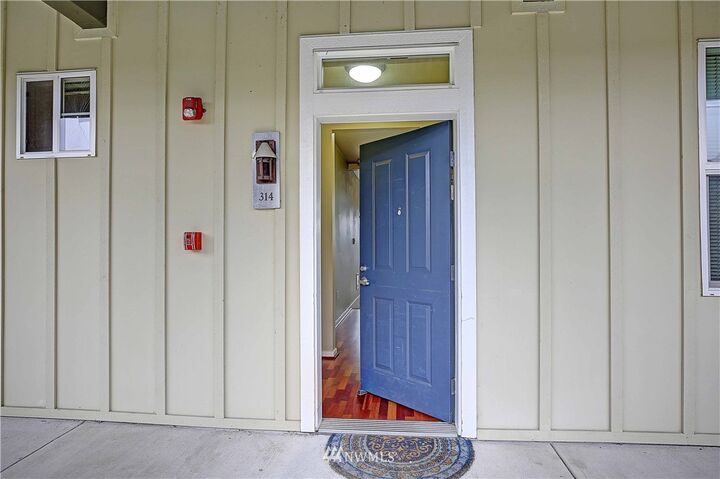 Property Photo: 7104 265th Street NW 314 WA 98292