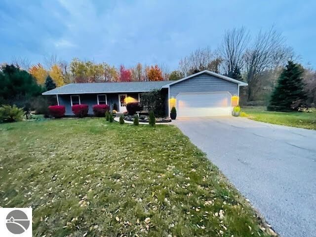 Property Photo:  5928 Cherry Blossom Drive  MI 49685 