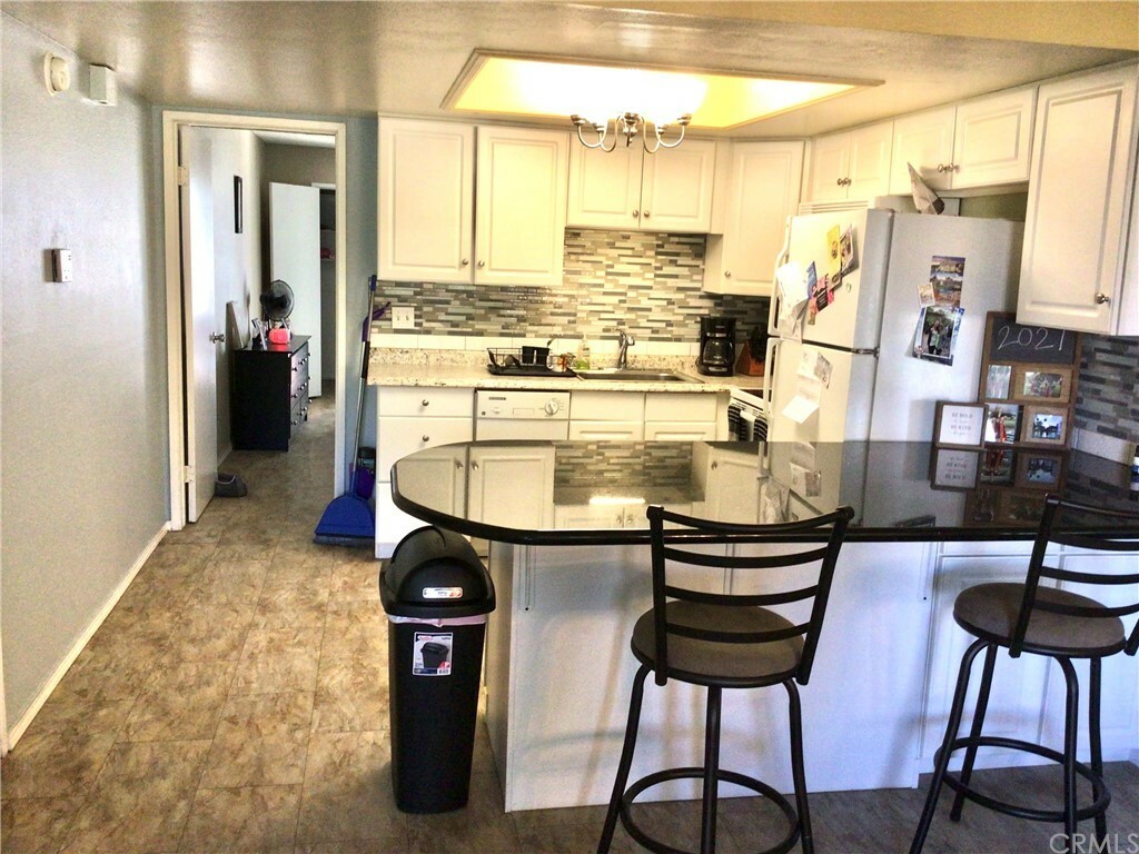 Property Photo:  9649 Spyglass Avenue 90  CA 92240 