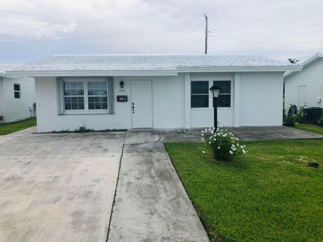 Property Photo: 142 NW 10th Court NW FL 33426