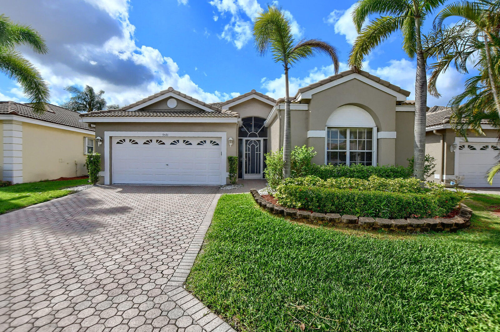 Property Photo: 9591 Orchid Grove Trail FL 33437