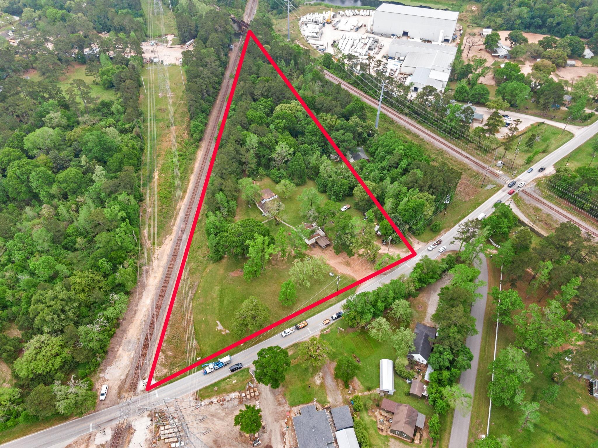 Property Photo: 26032 Hardin Store Rd TX 77354