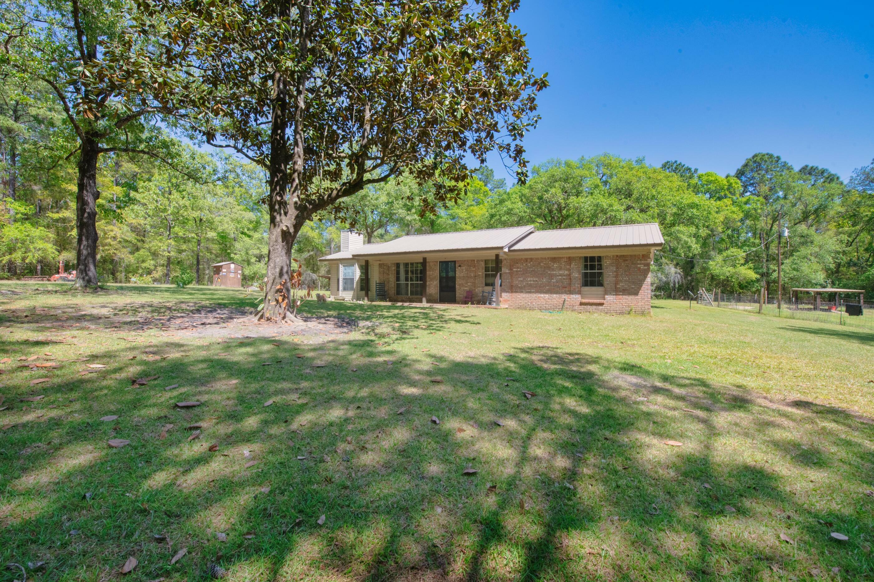 Property Photo:  7055 Bill Lundy Road  FL 32567 