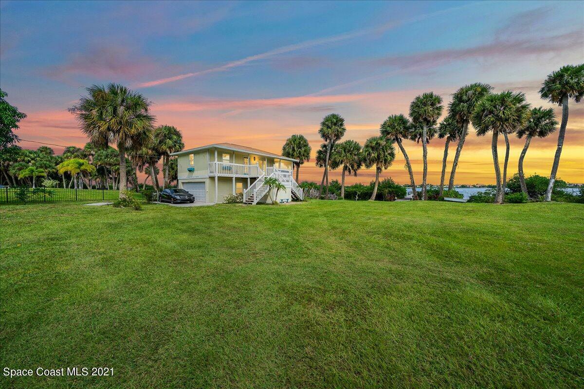 Property Photo: 10060 S Tropical Trail FL 32952