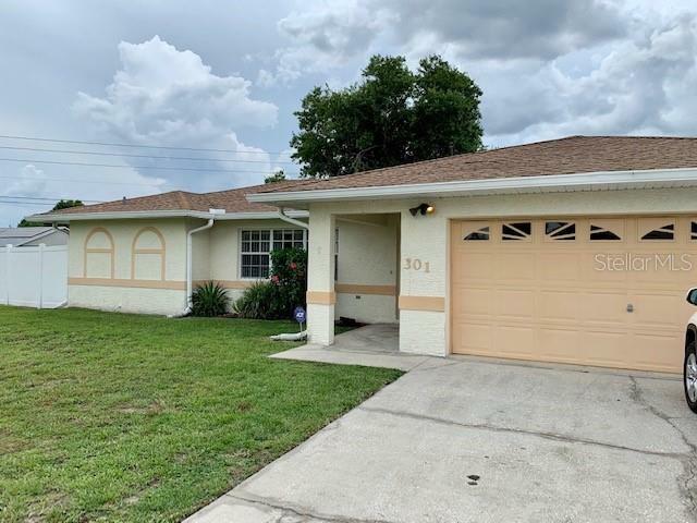 Property Photo:  301 Chiquita Court  FL 34758 