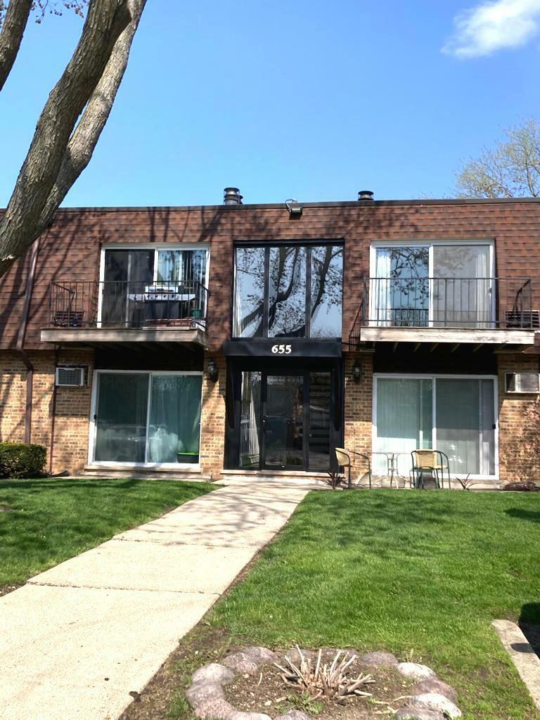 Property Photo:  655 Grove Drive 205-1  IL 60089 