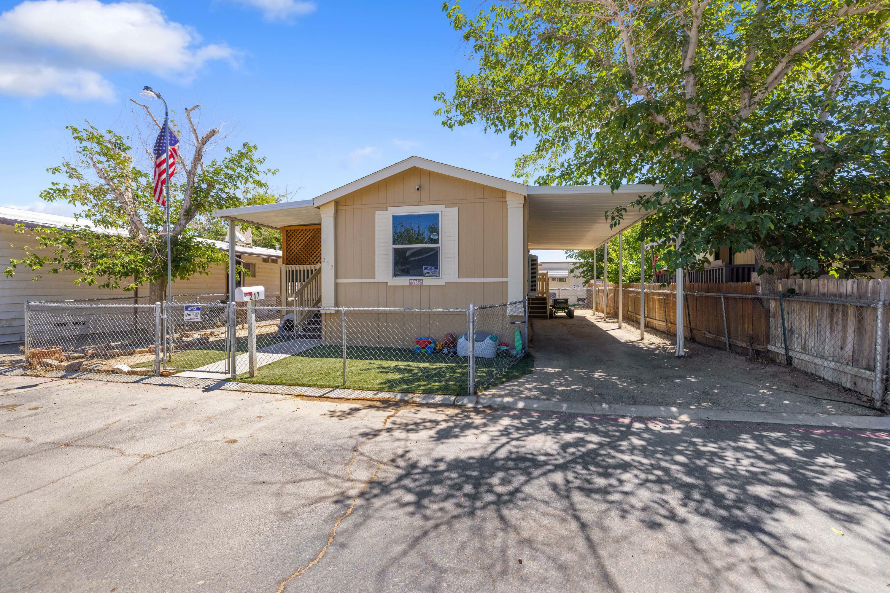 Property Photo:  45800 Challenger Way Spc 217  CA 93535 