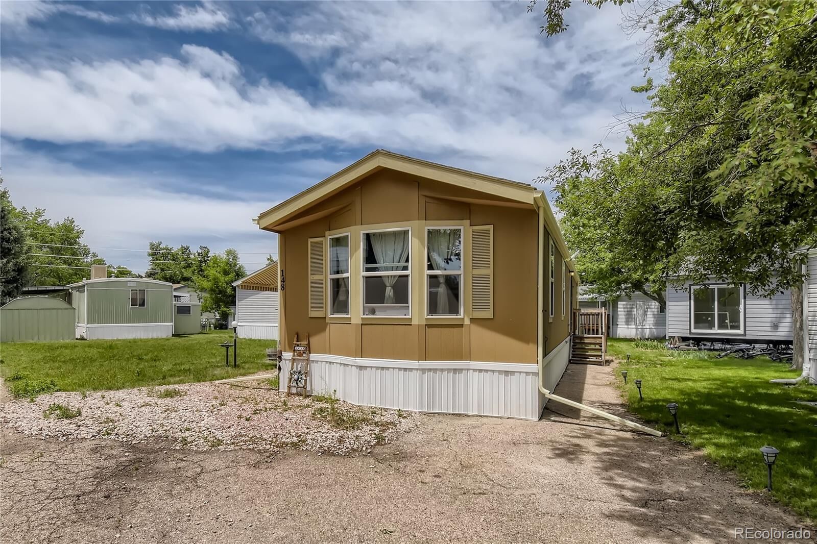 Property Photo:  3650 S Federal Boulevard  CO 80110 