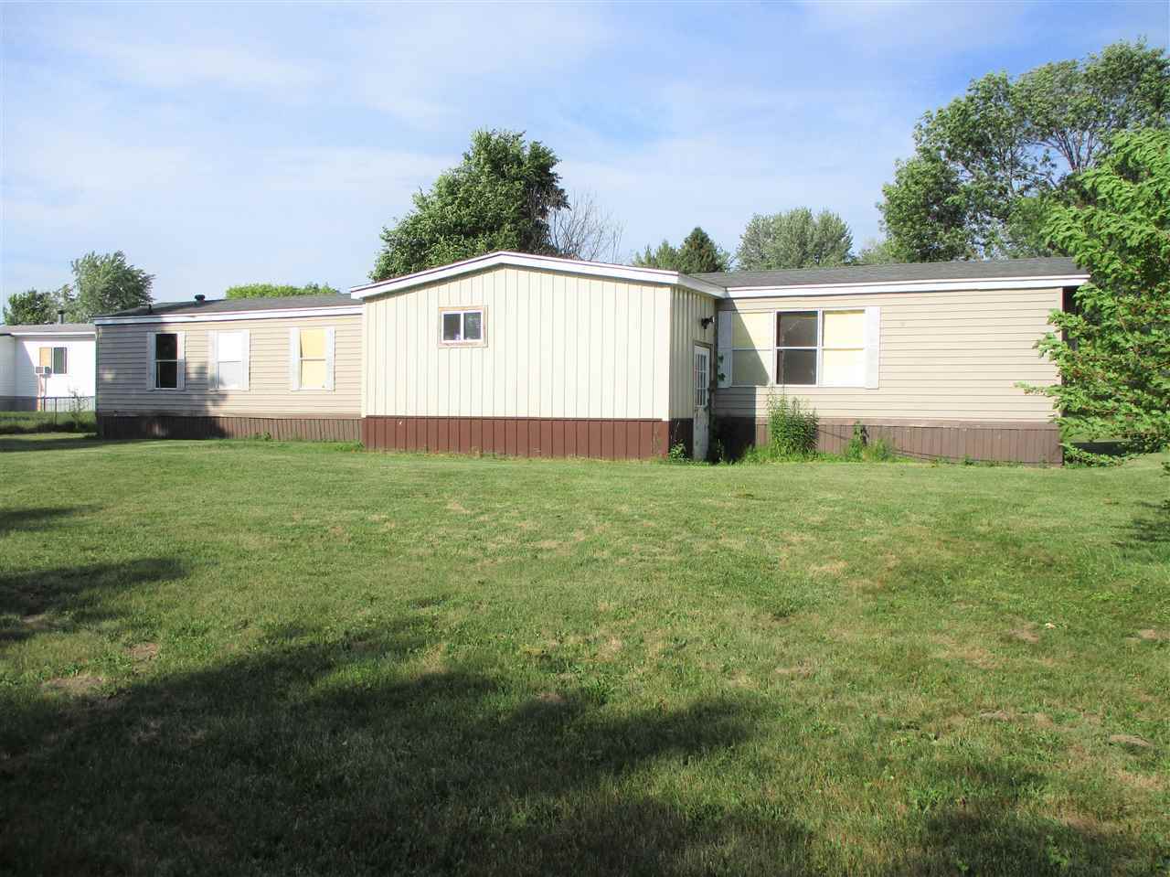 Property Photo:  1100 Country Court  MI 48449 