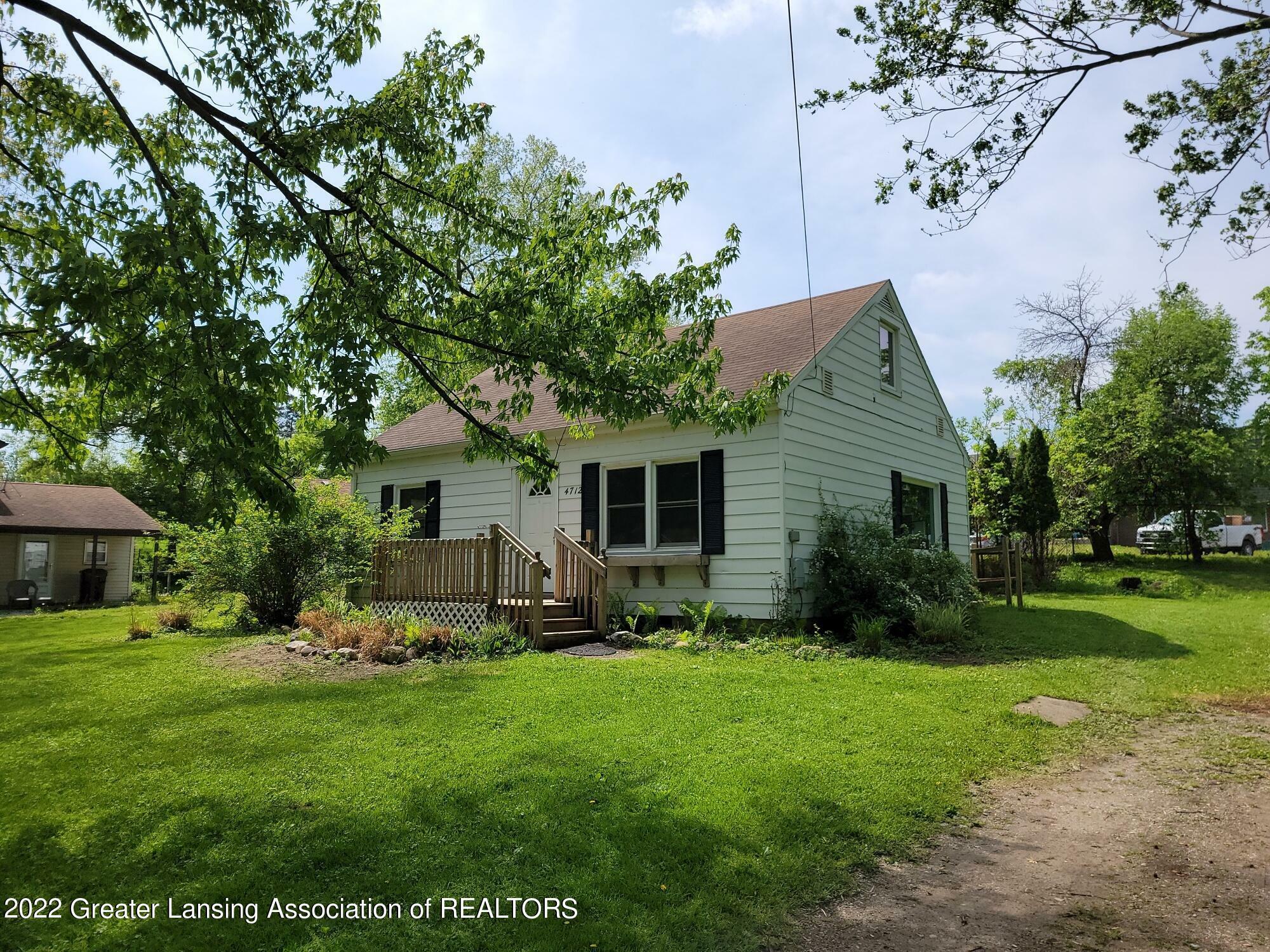Property Photo:  4712 Eastlawn Drive  MI 48910 