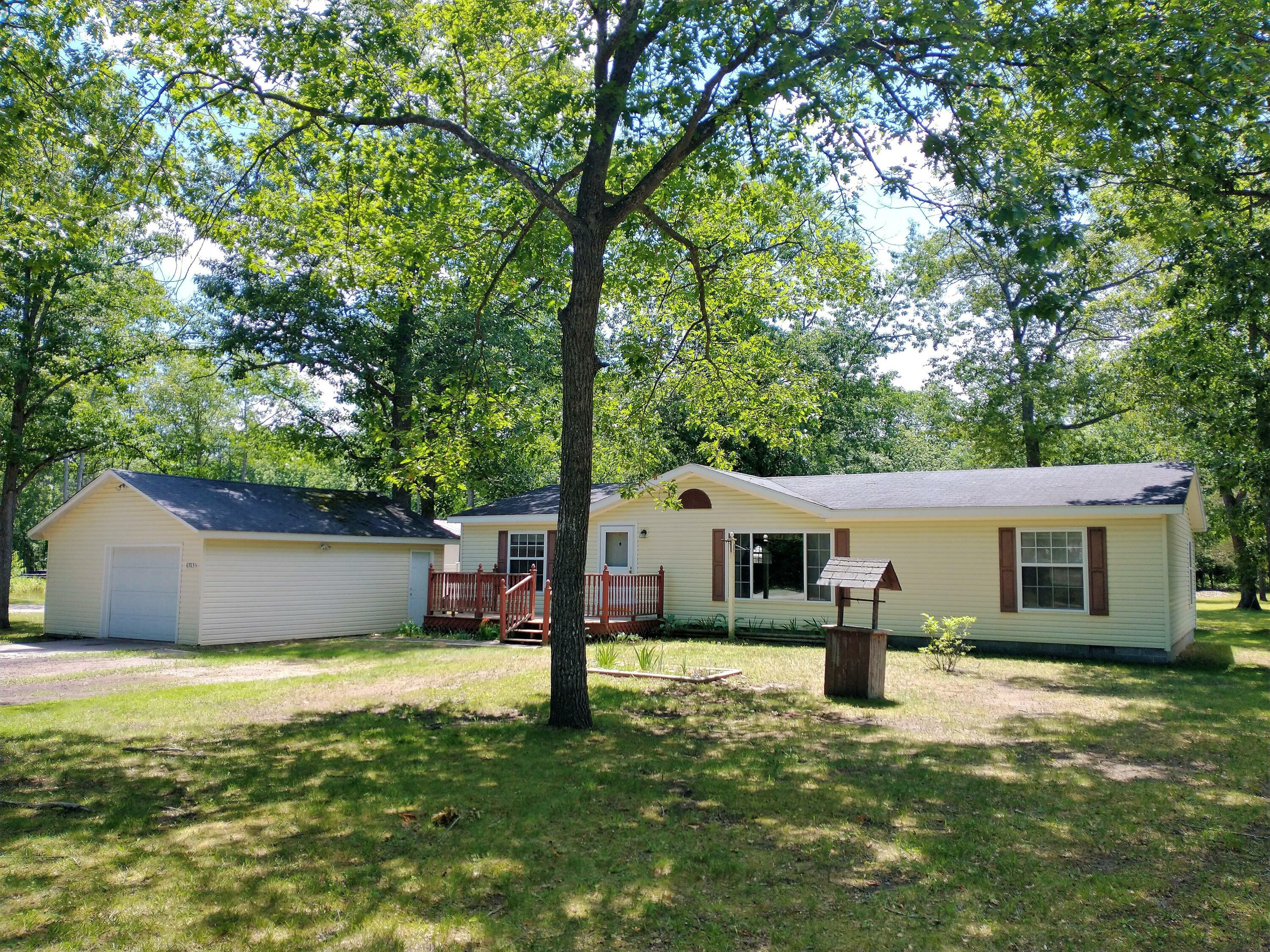 Property Photo: 6703 W Wilson Road MI 49749