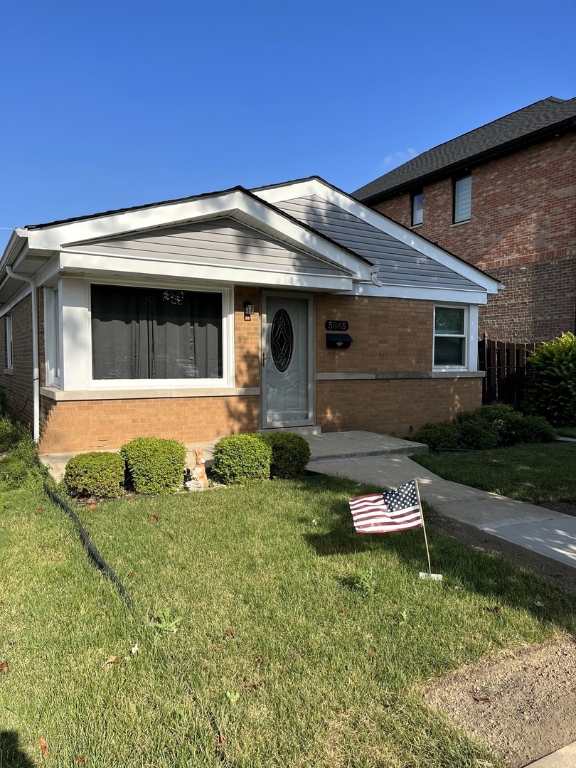 Property Photo:  5845 S Rutherford Avenue  IL 60638 