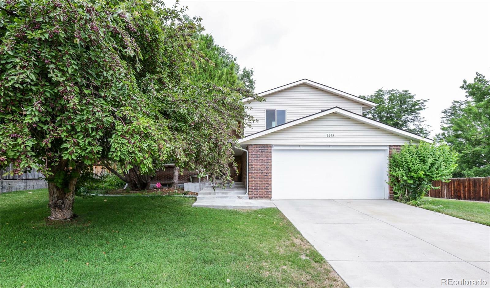 Property Photo:  6973 W Hinsdale Drive  CO 80128 