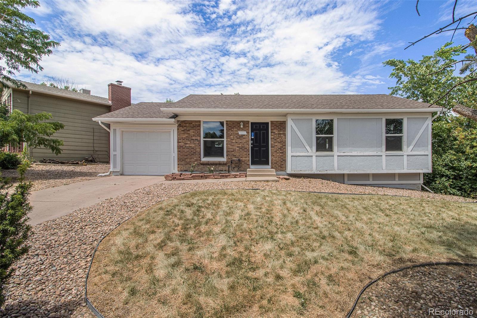 Property Photo: 17909 E Mexico Drive CO 80017