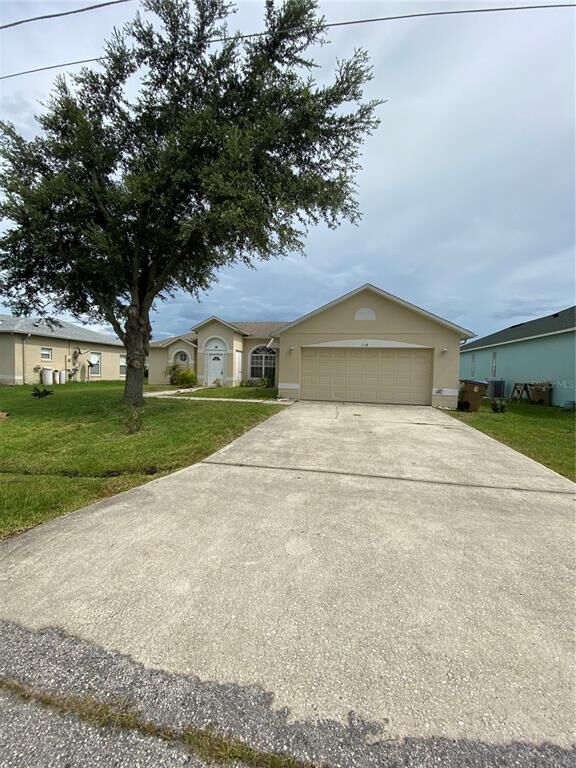 Property Photo: 208 Abbotsbury Drive FL 34758