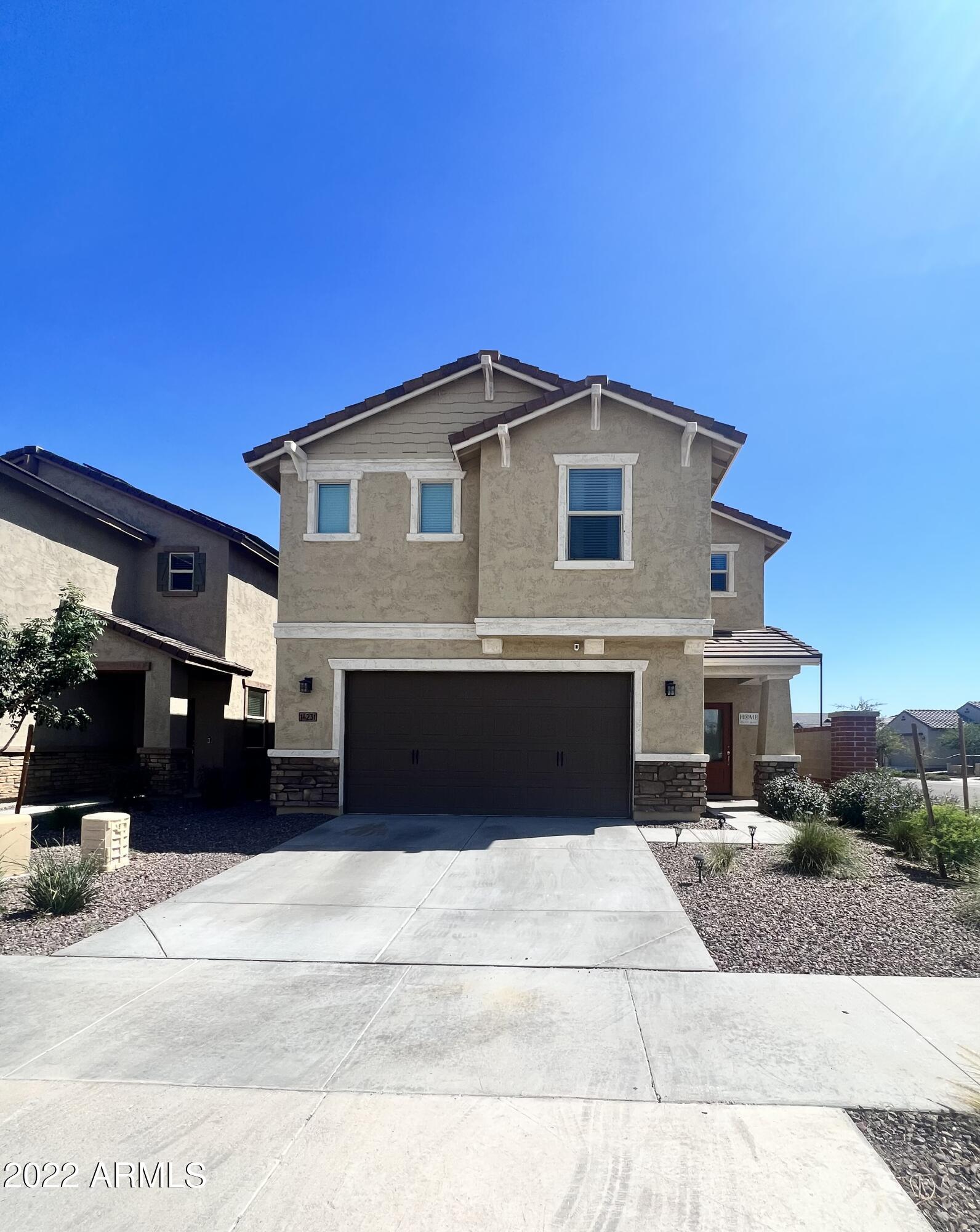 Property Photo: 14231 W Voltaire Street AZ 85379