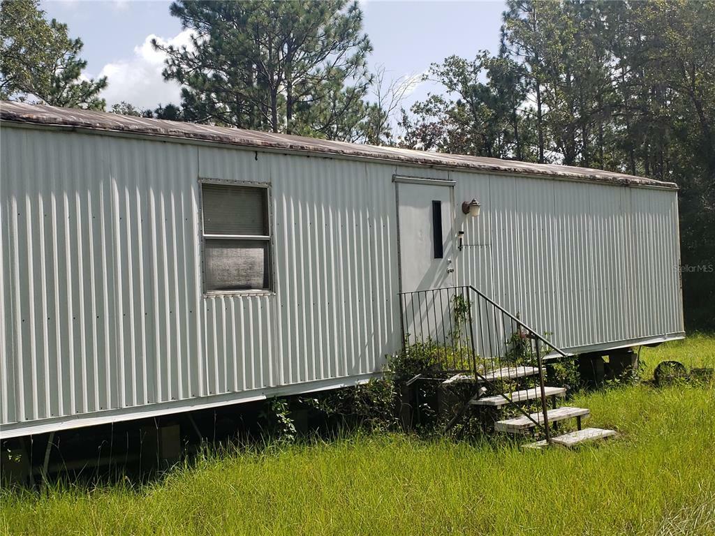 Property Photo:  10751 NE 55 Street  FL 32621 