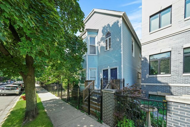 Property Photo: 1728 N Campbell Avenue 1 IL 60647